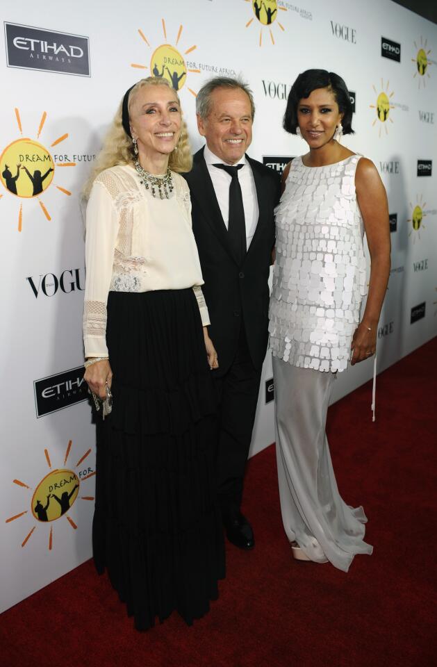 As editor of Vogue Italia, Franca Sozzani, left, changed dynamics in the couture world by featuring black models on the magazine's cover. She was honored at Dream for Future Africa's first gala. She stands with hosts Wolfgang Puck and his fashion designer/philanthropist wife, Gelila Assefa Puck, who founded Dream for Future Africa.