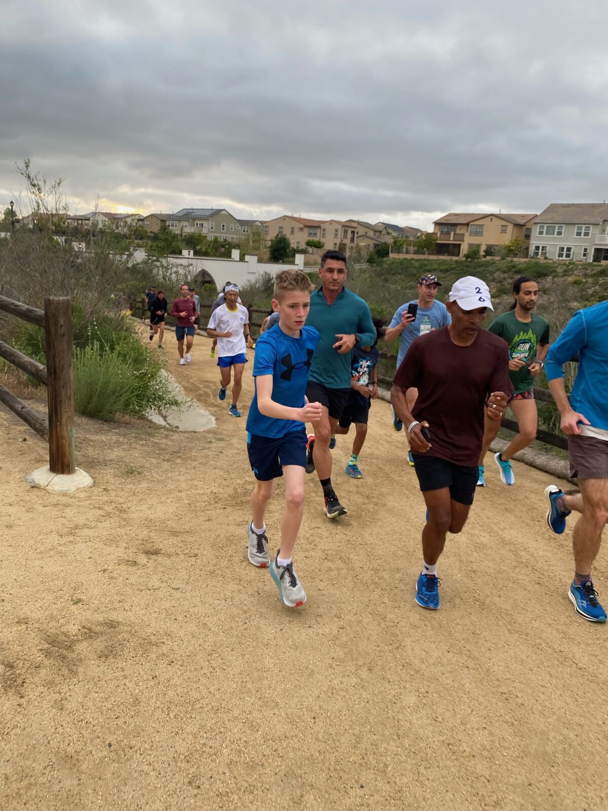 Meb Keflezighi runs with the group on the trail through Pacific Highlands Ranch.