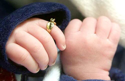 RING OF HOPE: A tiny ring was placed on the finger of Lee Crump Jr. after he was born.