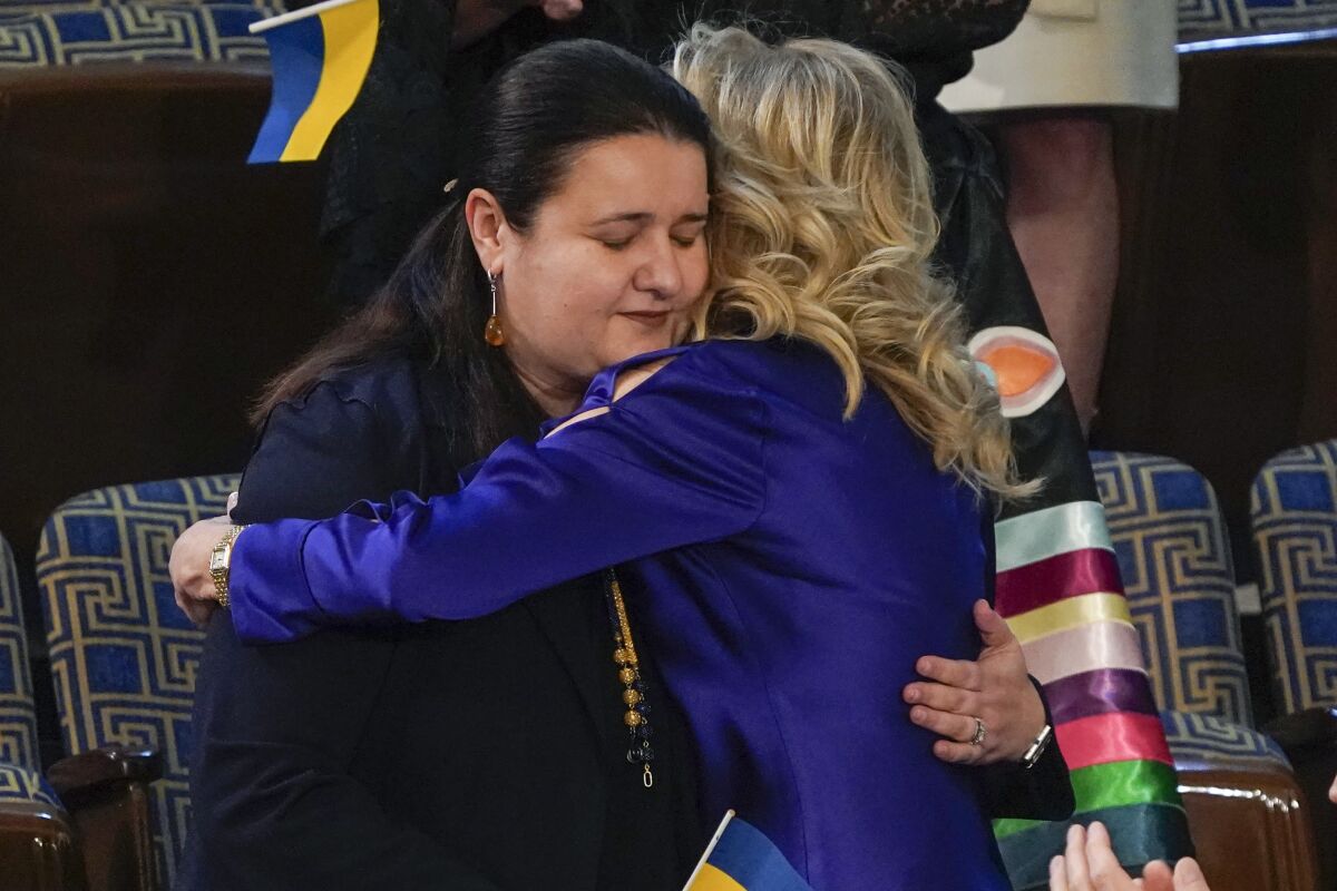 Ukraine Ambassador to the United States, Oksana Markarova, gets a hug from first lady Jill Biden during President Joe Biden's first State of the Union address to a joint session of Congress, at the Capitol in Washington, Tuesday, March 1, 2022. (AP Photo/J. Scott Applewhite, Pool)