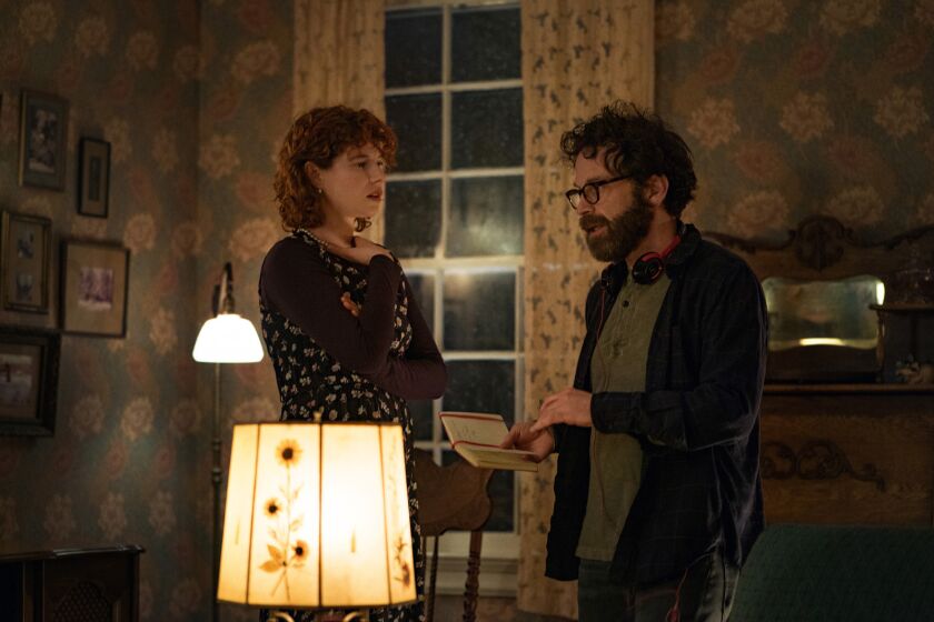 Im Thinking Of Ending Things. Jessie Buckley as Young Woman, Charlie Kaufman as Director in Im Thinking Of Ending Things. Cr. Mary Cybulski/NETFLIX © 2020