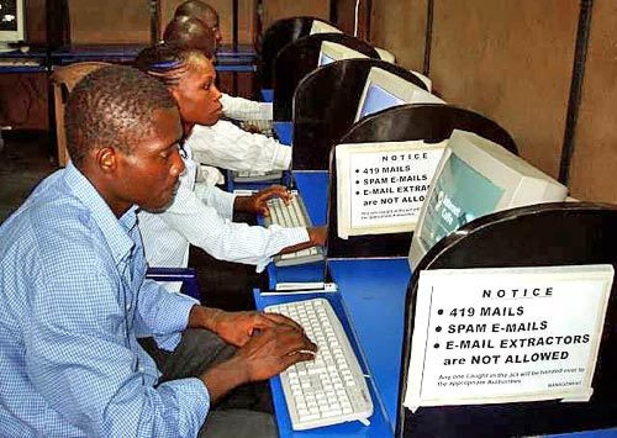 ONLINE: Nigerians use computers in an Internet cafe in Lagos. Scams known as 419  for the statute outlawing them  promise the victims riches and romance. When you get a reply, its 70% sure that youll get the money, a former scammer says.