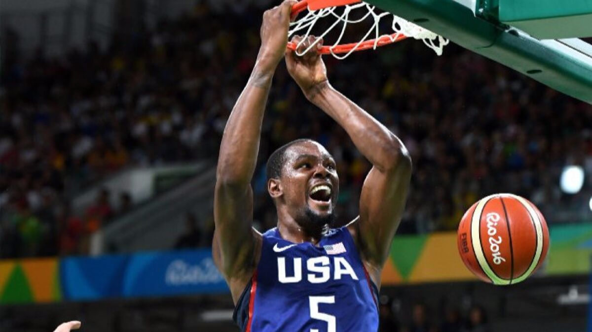 U.S. forward Kevin Durant dunks against Serbia during the gold medal game on Aug. 21.