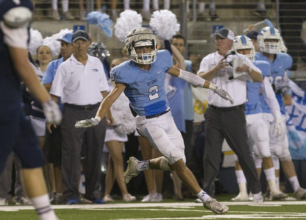 Corona del Mar High's Sutty Barbato reacts after deflecting a pass against Newport Harbor.