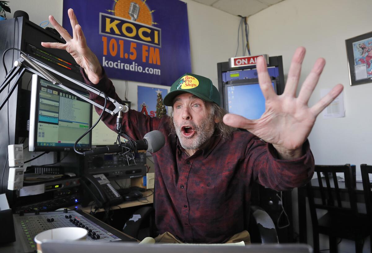 DJ Jim "Poorman" Trenton gets animated as he hosts the "Poorman's Morning Rush" show at KOCI Radio on Monday.