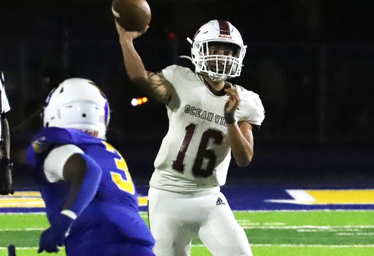 Ocean View quarterback Frankie Armenta is seen throwing a pass against Gahr on Sept. 1.