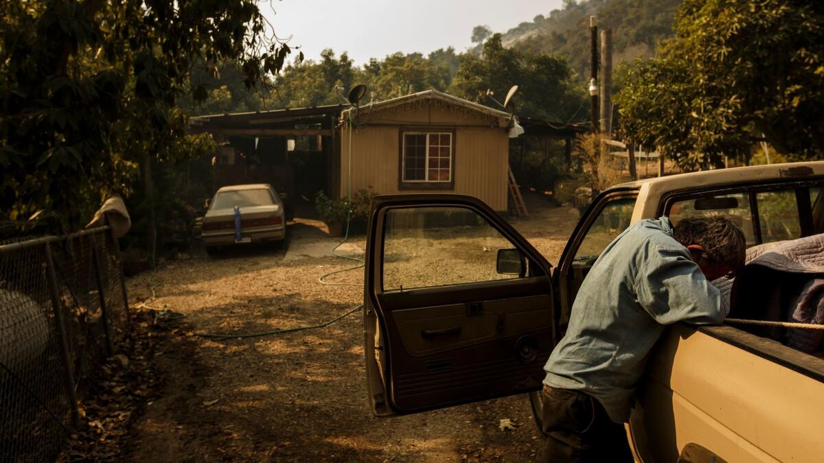 Arnulfo Basave wept after discovering that his trailer home on a Carpinteria ranch was still standing.