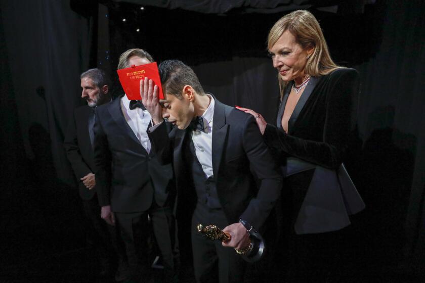 RESTRICTIONS:ÊTNS ANDÊWIREÊSERVICES OUT. NO SALES. TRONC NEWSPAPERS AND WEBSITES ONLY. THISÊPHOTOÊIS EMBARGOED UNTIL THE CONCLUSION OF THE ACADEMY AWARDS SHOW. IT CANNOT BE POSTED ON THE INTERNET OR ELSEWHERE UNTIL THE CONCLUSION OF THE ACADEMY AWARDS BROADCAST. HOLLYWOOD, ÊCA Ð February 24, 2019 Rami Malek reacts after winning the Actor in a Leading Role award for 'Bohemian Rhapsody' Êbackstage at the 91st Academy Awards on Sunday, February 24, 2019 at the Dolby Theatre at Hollywood & Highland Center in Hollywood, CA. Ê(Al Seib / Los Angeles Times)
