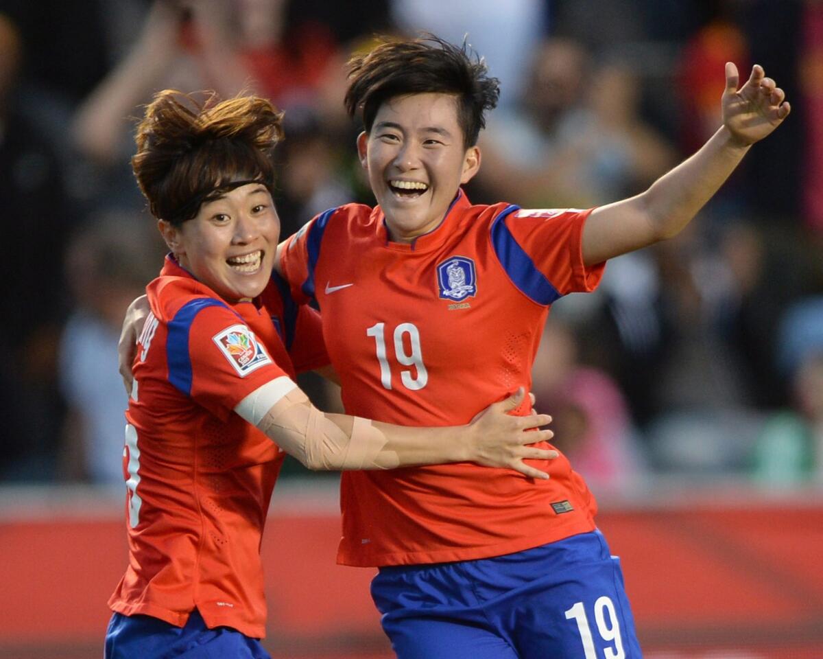 South Korea's Kim Sooyun (19) celebrates after scoring against Spain during the second half of a Group E match Wednesday at the Women's World Cup.