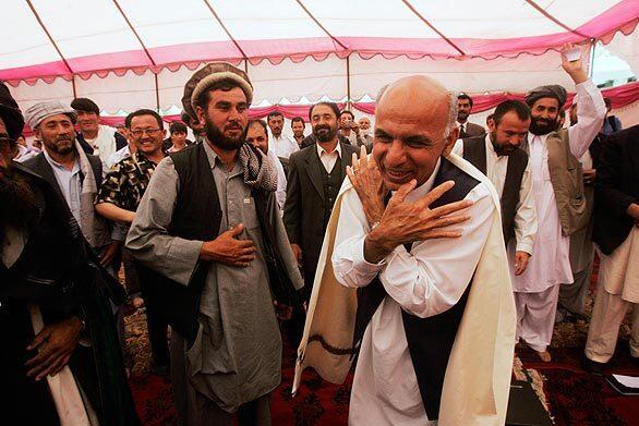 Opposition presidential candidate Ashraf Ghani Ahmadzai greets supporters at a rally in Kabul earlier in the month.