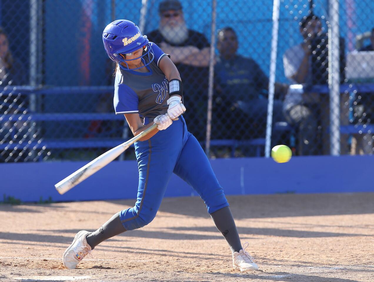 Fountain Valley's Samara Ortega drives the ball for a hit in a Wave League game against Newport Harbor on Wednesday.