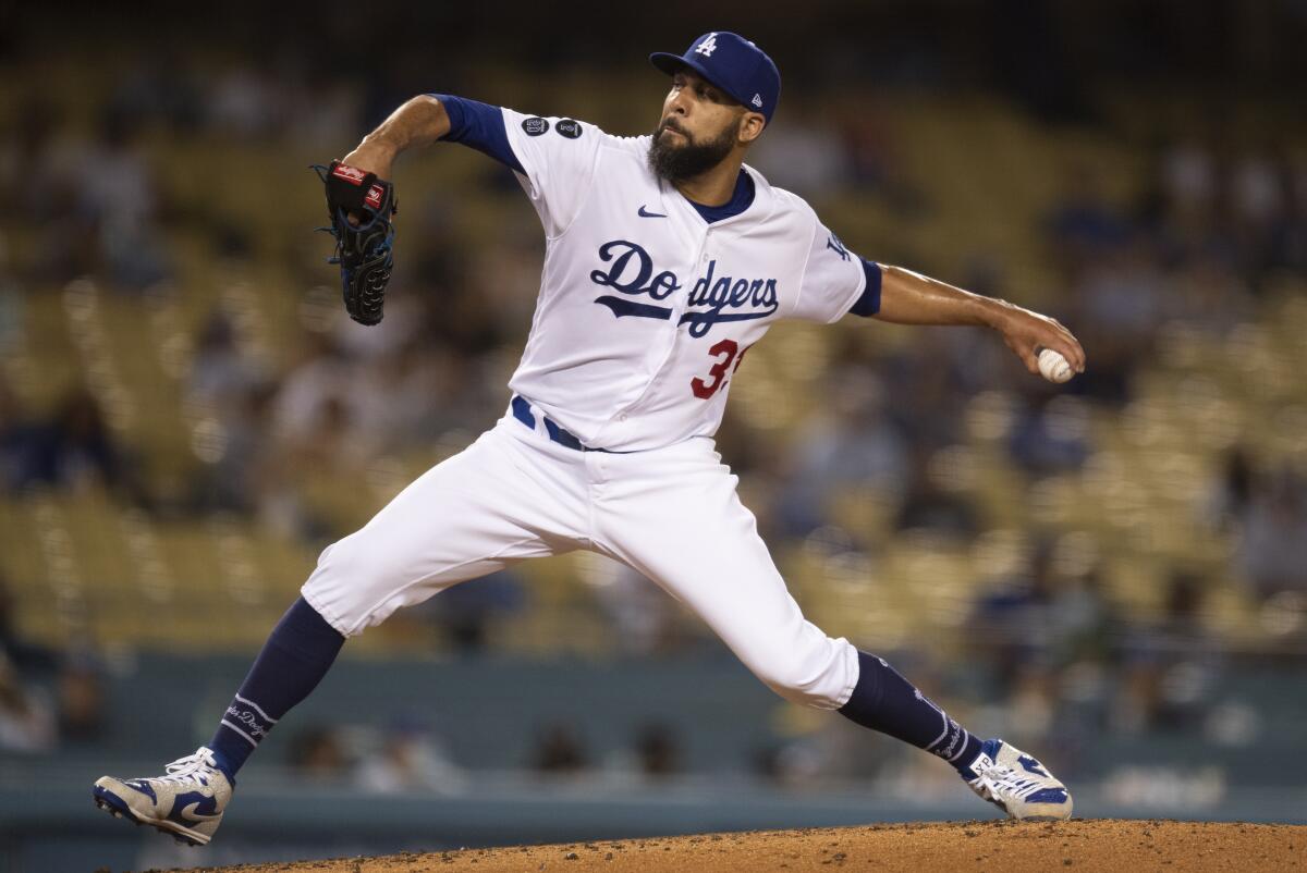 Los Angeles Dodgers relief pitcher David Price delivers during the fourth inning of a baseball game.
