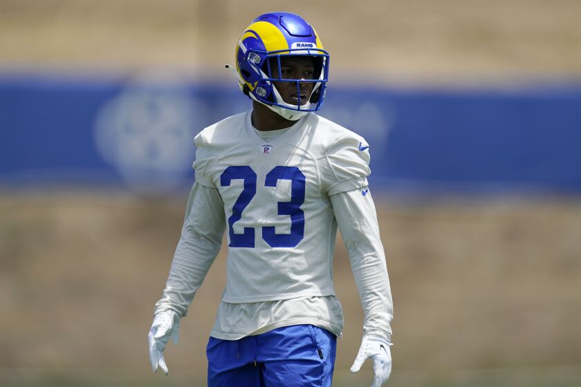 Los Angeles Rams running back Cam Akers stands on the field during an NFL football practice Tuesday, June 8, 2021, in Thousand Oaks, Calif. (AP Photo/Mark J. Terrill)