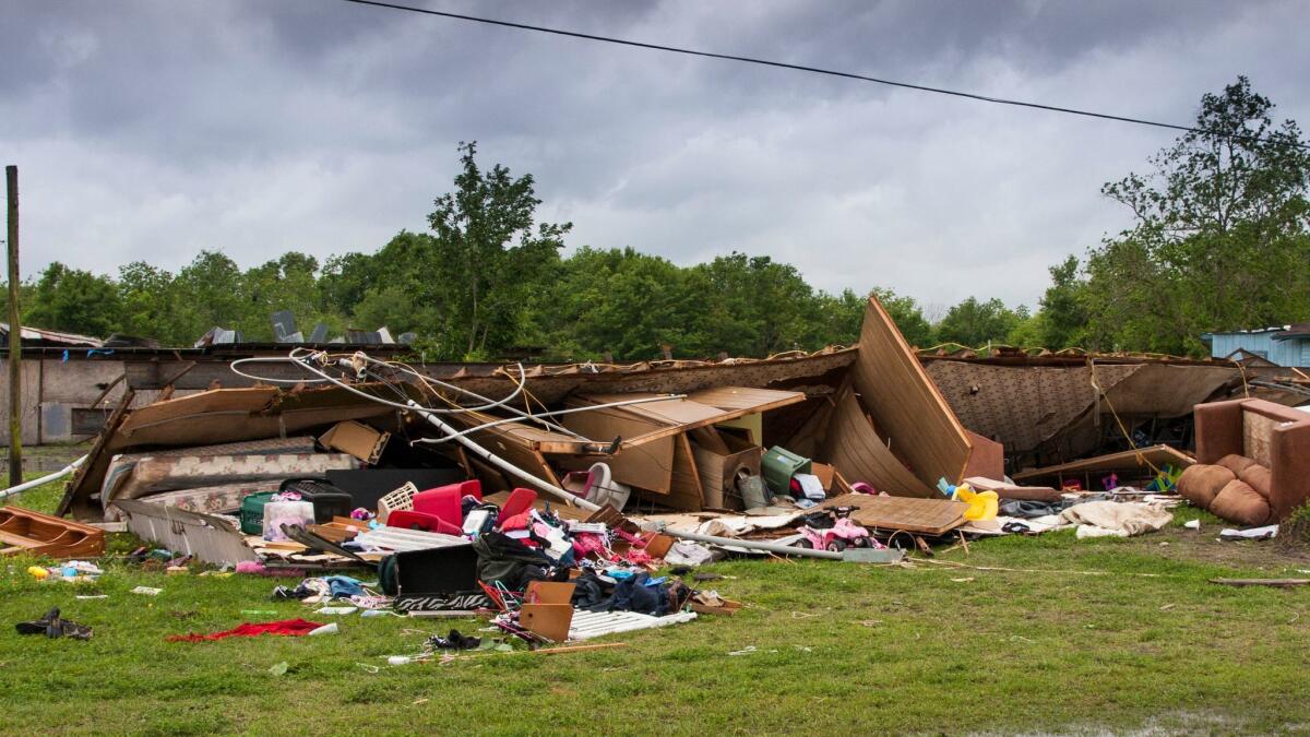 The remains of a trailer lie where a woman and her 3-year-old daughter were killed during a severe storm in Breaux Bridge, La., on April 2, 2017.