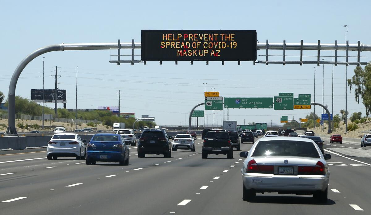 Arizona highway sign urging mask-wearing