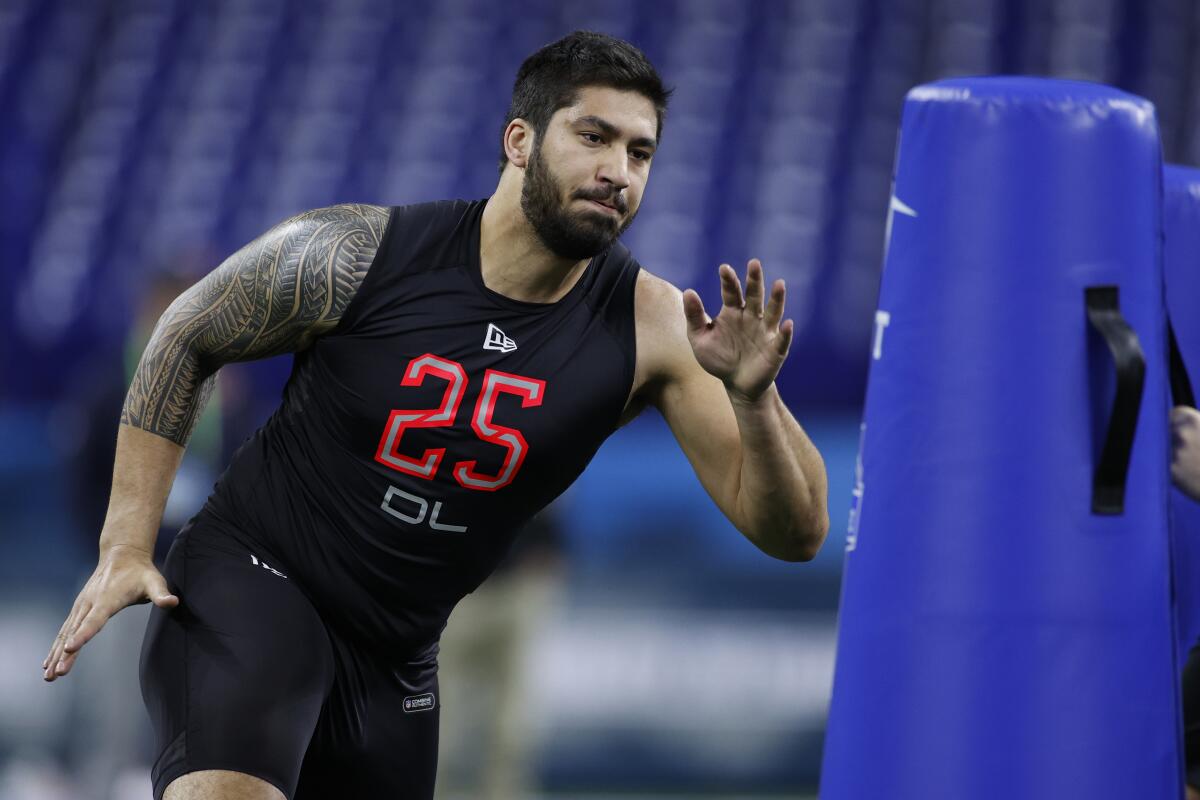 Defensive lineman A.J. Epenesa of Iowa runs a drill during the NFL combine