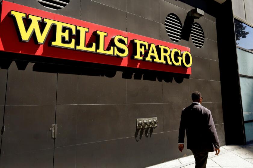 A Wells Fargo office in Oakland. The bank's CEO says that aggressive sales tactics were not part of an "orchestrated effort."