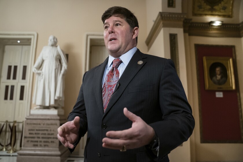 FILE - In this Feb. 15, 2019 file photo, Rep. Steven Palazzo, R-Miss., reacts during a television news interview on Capitol Hill in Washington. The House Ethics Committee is reviewing ethics allegations against Palazzo. (AP Photo/J. Scott Applewhite, File)