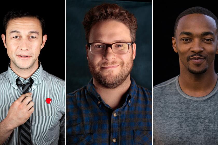 From left, Joseph Gordon-Levitt, Seth Rogen and Anthony Mackie will star in Sony's untitled Christmas comedy, which has a new release date of Nov. 25, 2015.