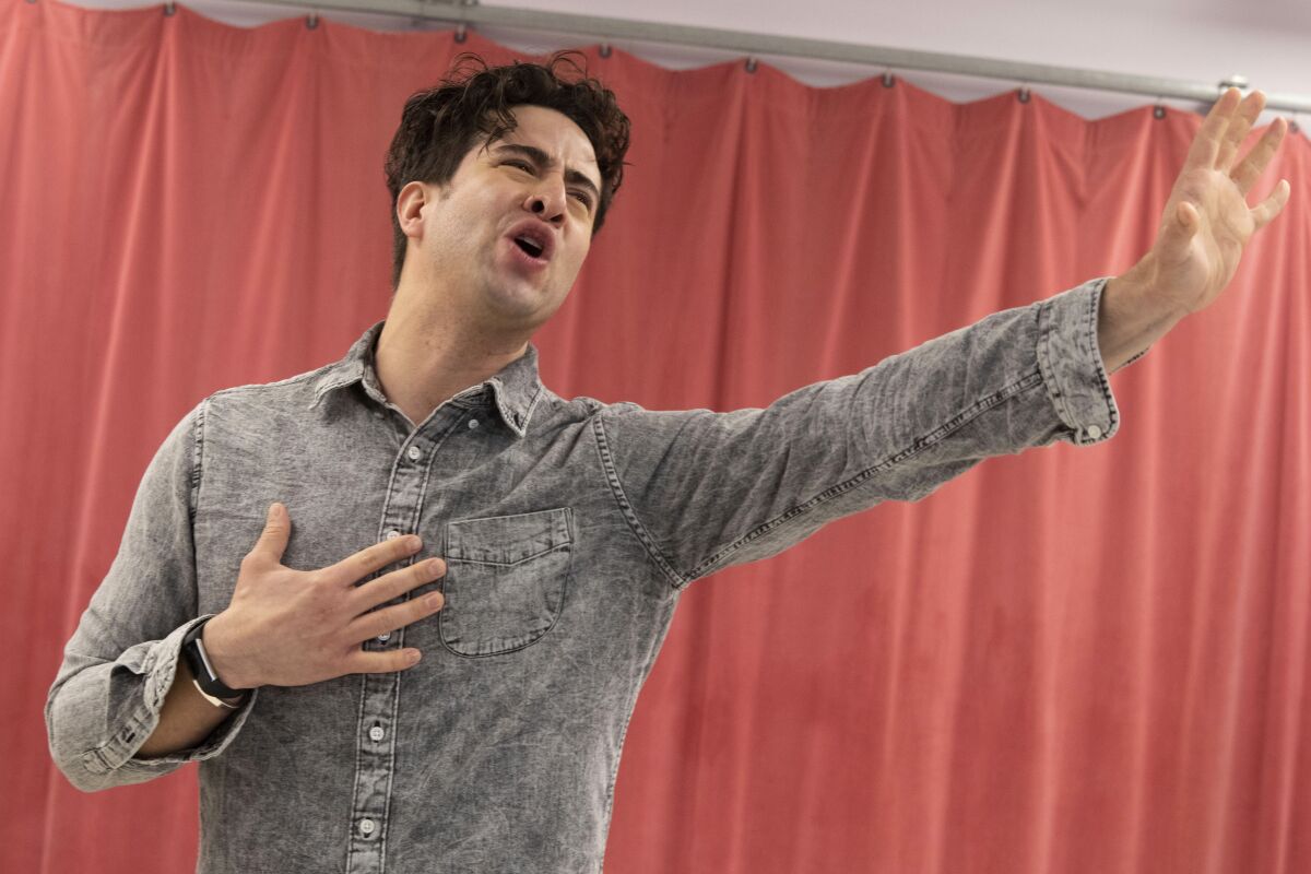 Actor Sean Ewing performs during the press preview for "Americano!" an Off-Broadway musical at Ripley-Grier studios on Thursday, March 17, 2022, in New York. (Photo by Andy Kropa/Invision/AP)