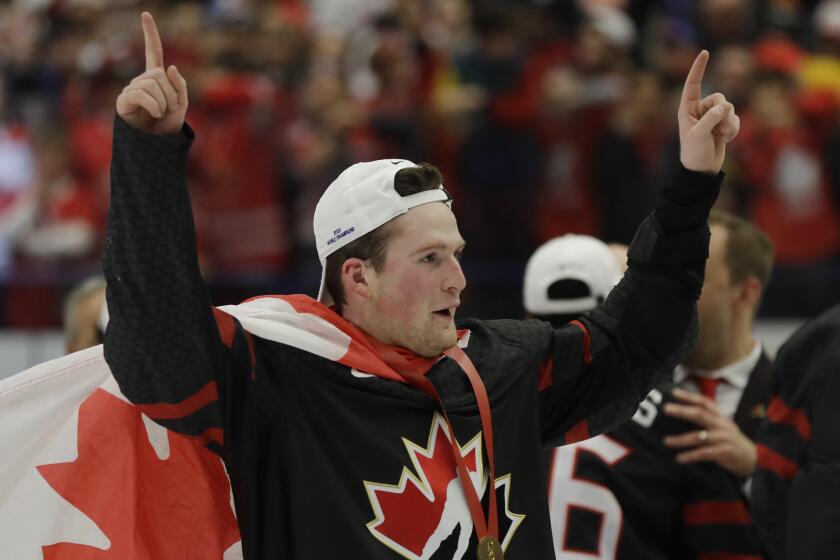 Canada's Alexis Lafreniere celebrates after winning the U20 Ice Hockey Worlds.