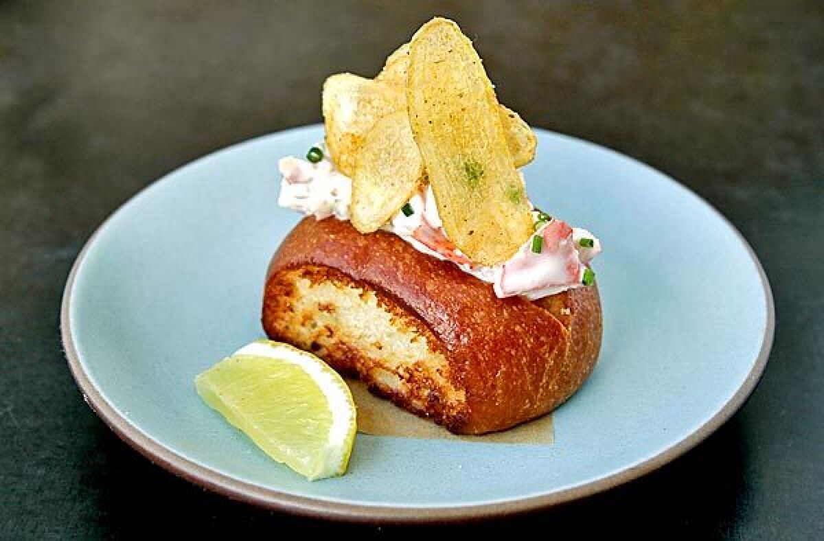At Son of a Gun, the fresh meat in the lobster roll is dressed with celery and lemon aioli.