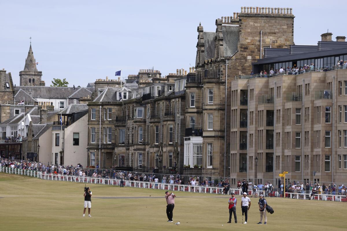 Former British Open champion Mark Calcavecchica of the U.S. plays a shot on the first hole on the Old Course at St Andrews
