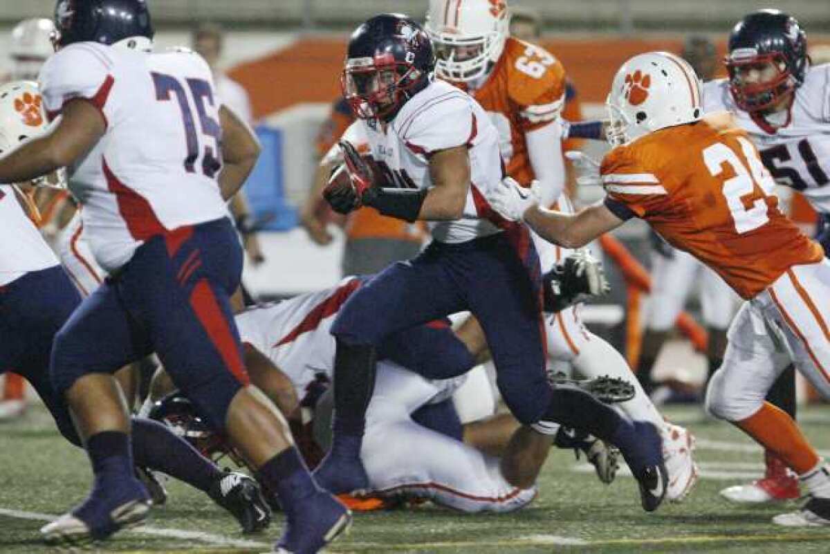 Bell-Jeff's Josh Martinez weaves through the Pasadena Poly defense.