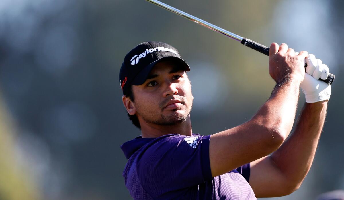 Jason Day follows through on his tee shot at No. 12 during the second round of the Farmers Insurance Open.