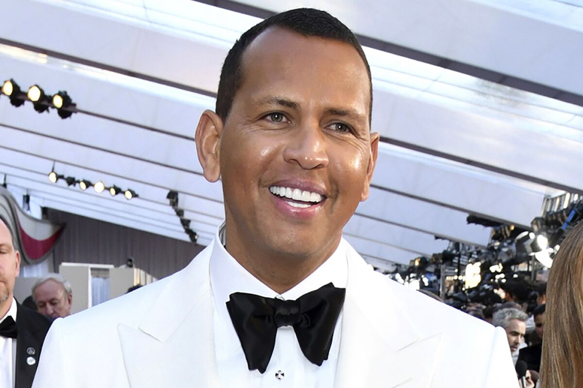 FILE - Alex Rodriguez arrives at the Oscars at the Dolby Theatre in Los Angeles, Sunday, Feb. 24, 2019. Baseball great Alex Rodriguez is taking a swing at mixed martial arts as an investor and board member for the Professional Fighters League. The PFL announced the addition of the former Yankees superstar to its board of directors Thursday, May 19, 2022. (Photo by Charles Sykes/Invision/AP, File)
