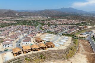 Irvine, CA - August 11: New home construction at the Portola Springs development tract on Sunday, Aug. 11, 2024 in Irvine, CA. Irvine has grown the most of any big city in California since 2020 and accounts for more than one-third of the new homes built in Orange County since 2010. (Brian van der Brug / Los Angeles Times)