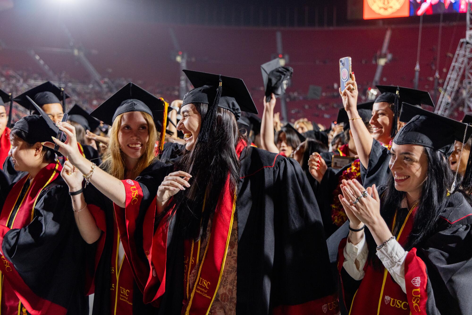 USC graduates cheer.