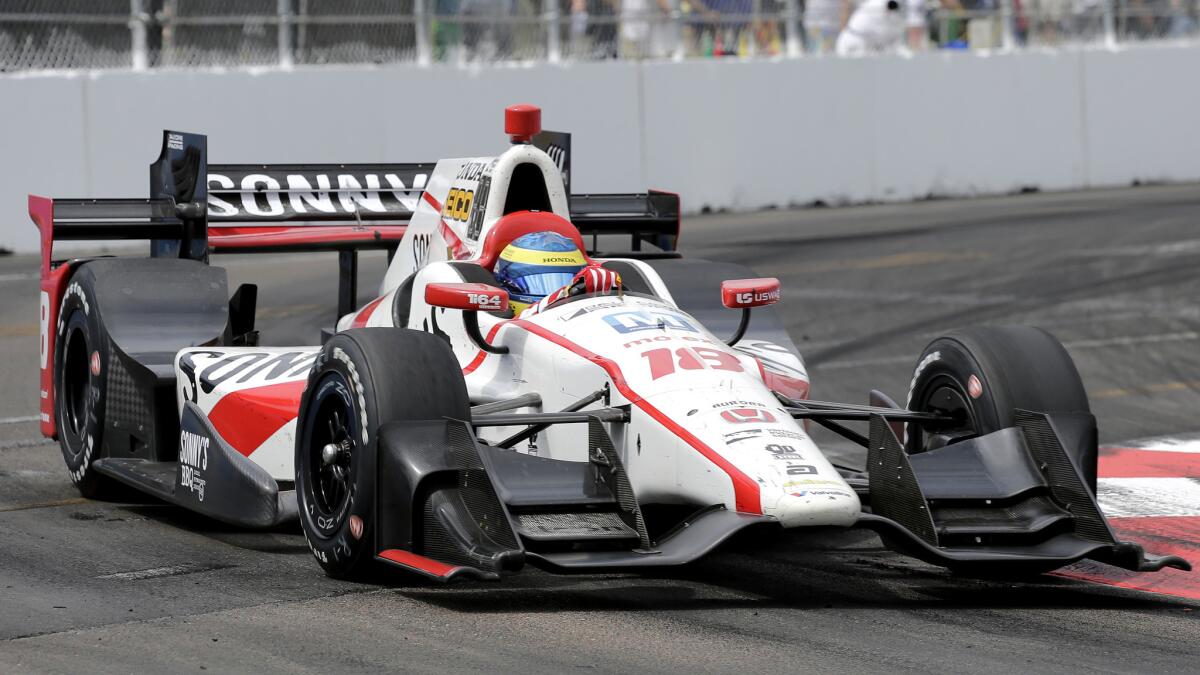 IndyCar driver Sebastien Bourdais takes a corner during the race at St. Petersburg on Sunday.