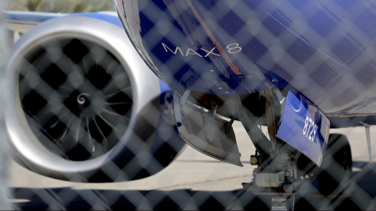 A Southwest Airlines Boeing 737 Max 8 plane is grounded at Hollywood Burbank Airport in Burbank, Calif. on March 13.