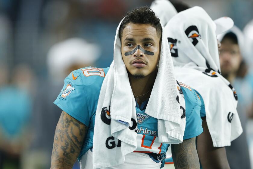 MIAMI, FLORIDA - AUGUST 08: Kenny Stills #10 of the Miami Dolphins looks on from the sideline against the Atlanta Falcons during the second quarter of the preseason game at Hard Rock Stadium on August 08, 2019 in Miami, Florida. (Photo by Michael Reaves/Getty Images)