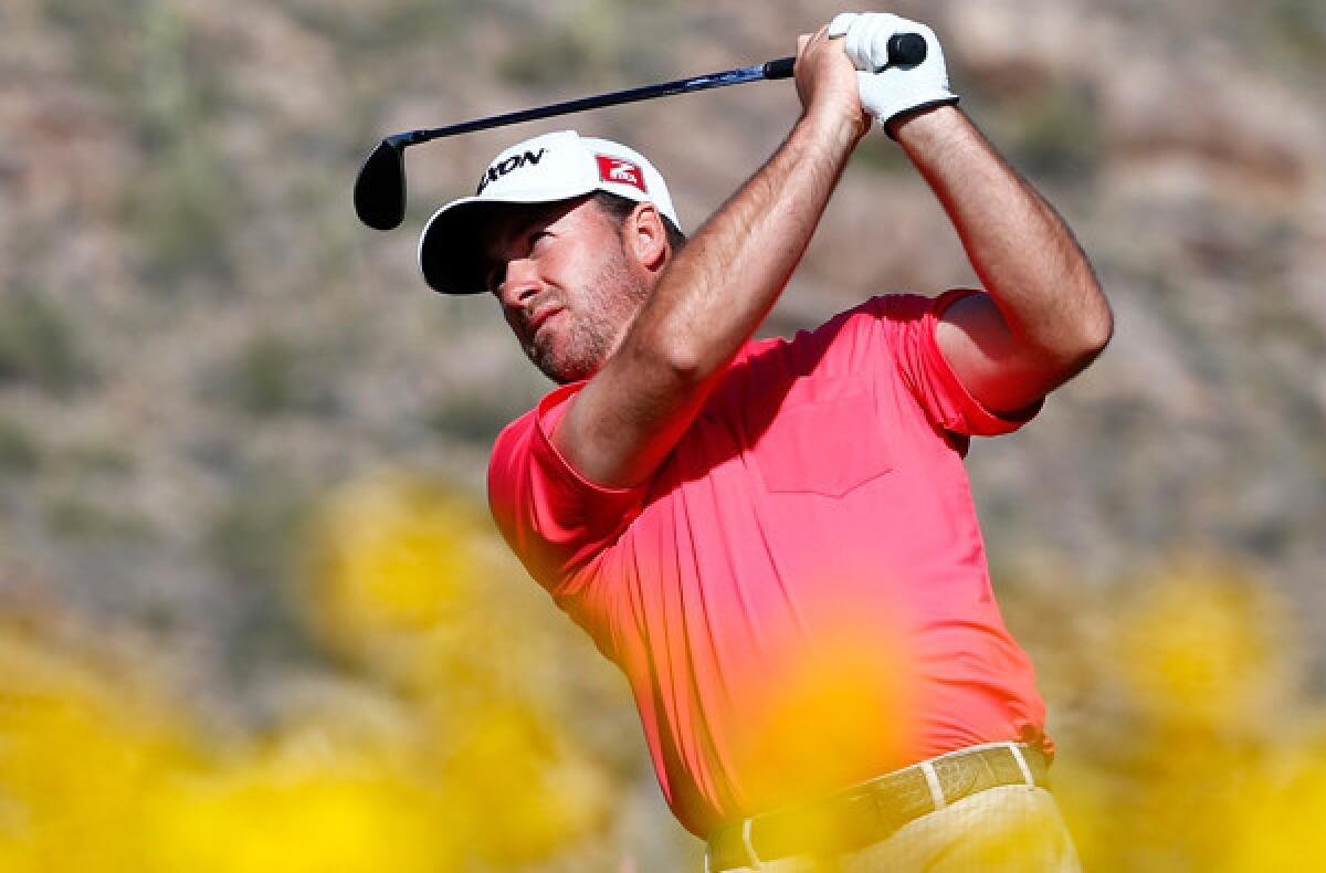 Graeme McDowell of Northern Ireland plays a shot at No. 16 during the second round of the Match Play Championship on Thursday at Dove Mountain.