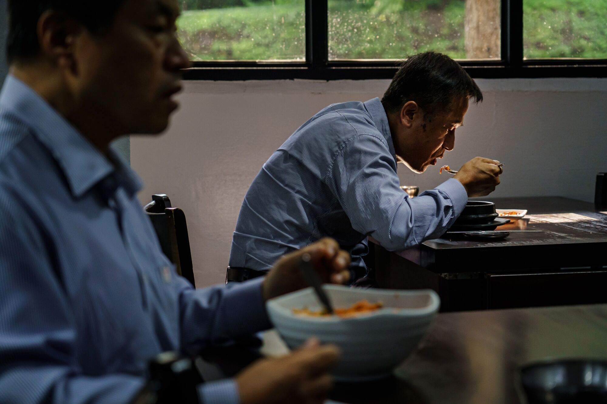 Taxi drivers eat a late lunch at Suncheon Gisa Sikdang, a driver restaurant, in Seoul.