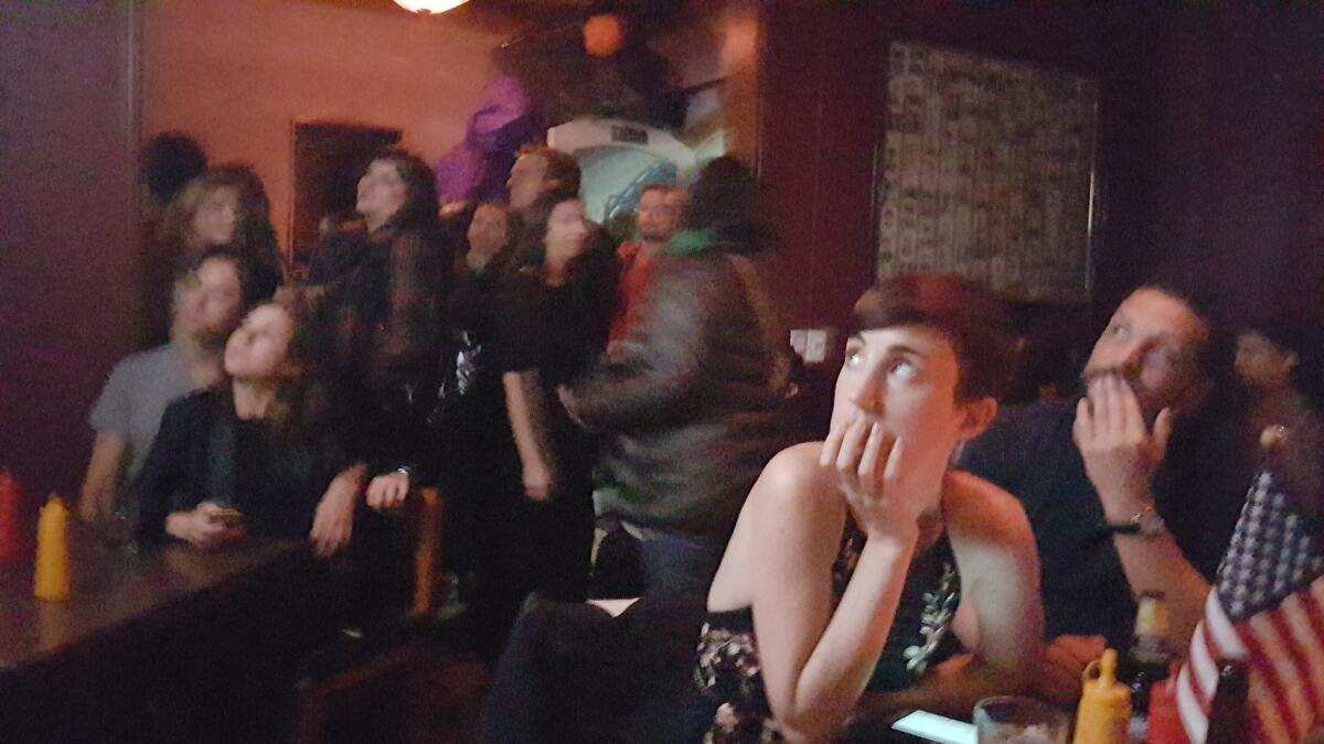 Patrons at a Mexico City bar react to Donald Trump's surprise victory Nov. 8.