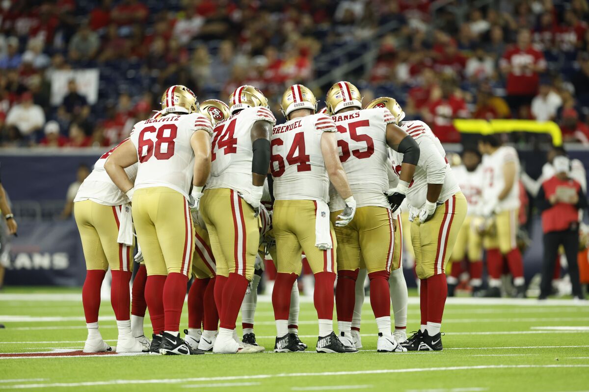 San Francisco 49ers offensive huddle during an NFL preseason game against the Houston Texans on Thursday, August 25, 2022, in Houston. (AP Photo/Matt Patterson)
