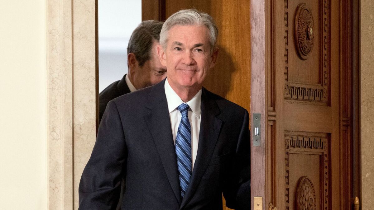 Jerome H. Powell arrives to take the oath of office as chairman of the Federal Reserve on Feb. 5.
