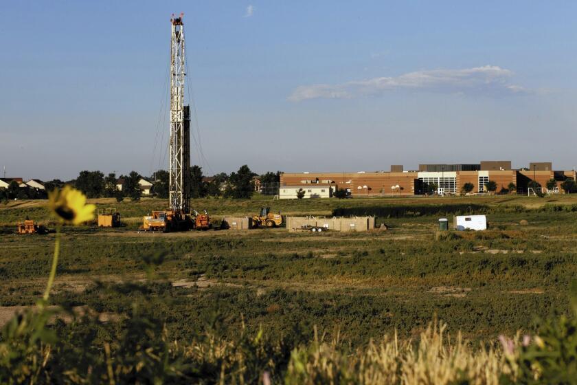 A drilling rig sits in a field in Colorado. Water samples collected at Colorado hydraulic fracturing sites show the presence of endocrine-disrupting chemicals, which can affect human hormones, scientists say.