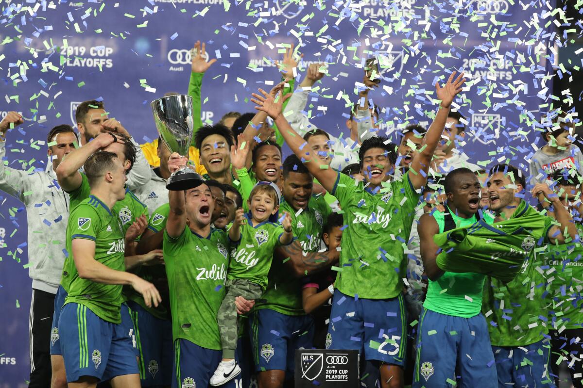 The Seattle Sounders celebrate their victory.