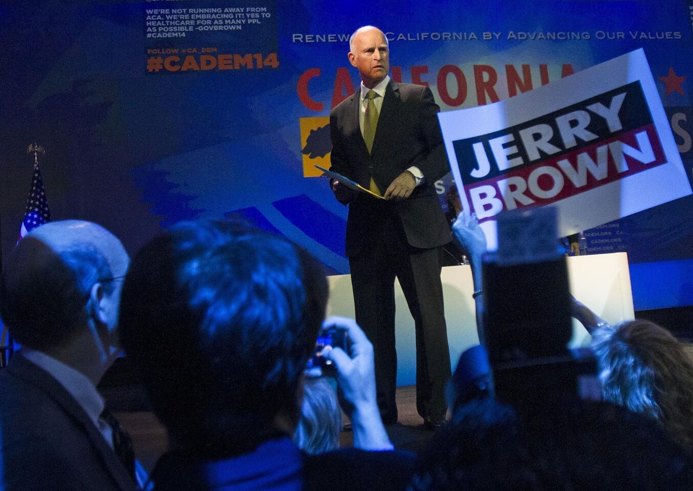 Supporters of Gov. Jerry Brown take photos of Brown after speaking at the California Democratic Convention on Saturday at the Los Angeles Convention Center.