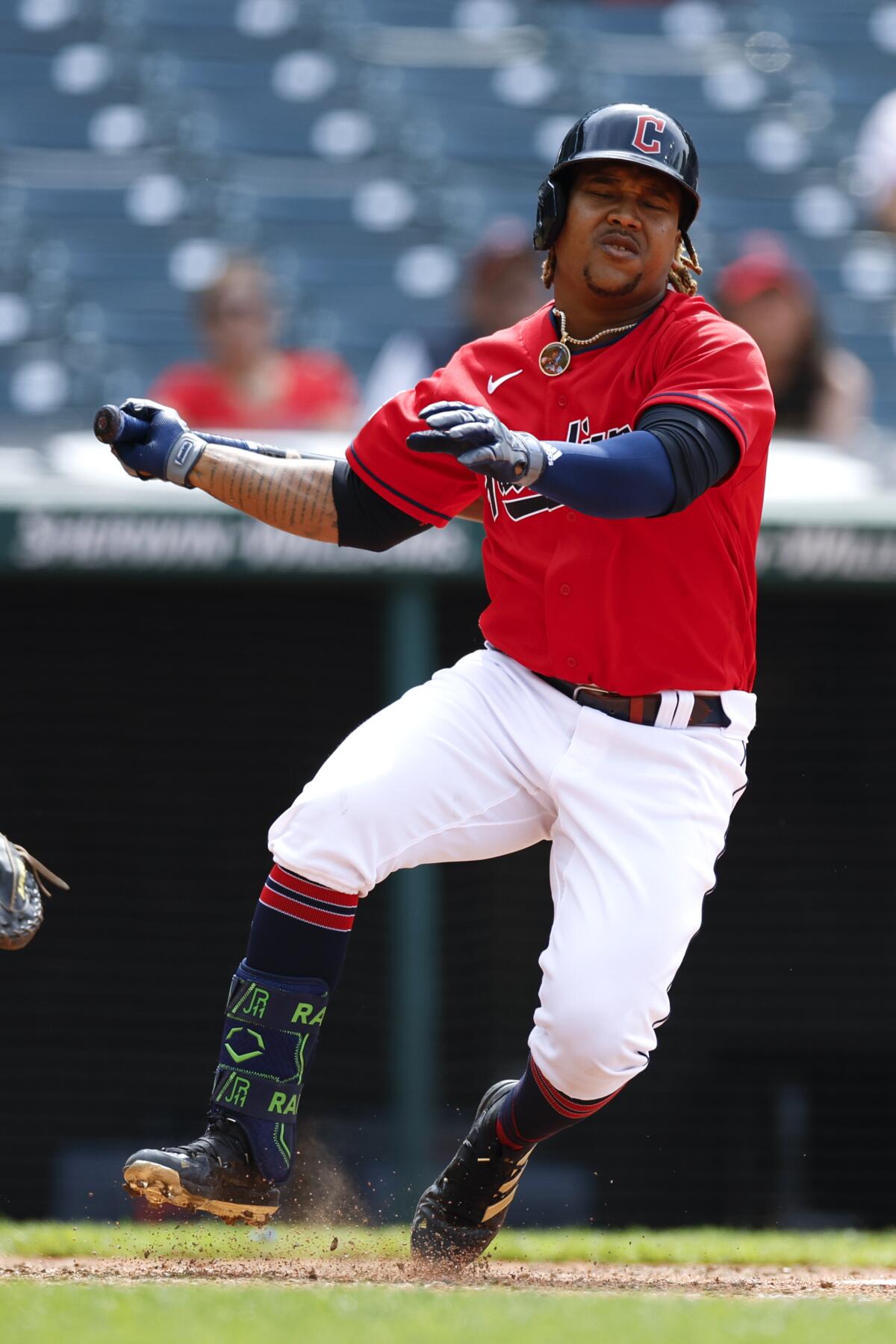 Cleveland Guardians' José Ramírez reacts after fouling a ball off his leg during the eighth inning of a baseball game against the Cincinnati Reds, Thursday, May 19, 2022, in Cleveland. (AP Photo/Ron Schwane)