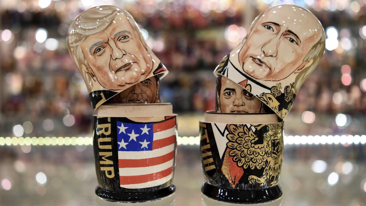 Matryoshka dolls depict President Donald Trump and Russia's President Vladimir Putin at a gift shop in central Moscow.