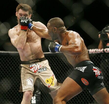 Rashad Evans connects with a right to Forrest Griffin during their UFC light-heavyweight bout on Saturday night at the MGM Grand Garden Arena in Las Vegas.