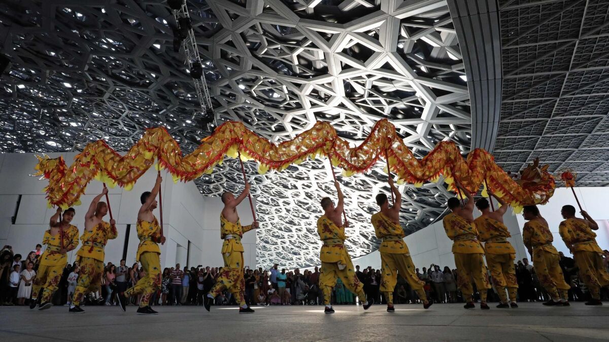 Dancers from a Korean musical ensemble perform during the opening of the Louvre Abu Dhabi on Nov. 11.