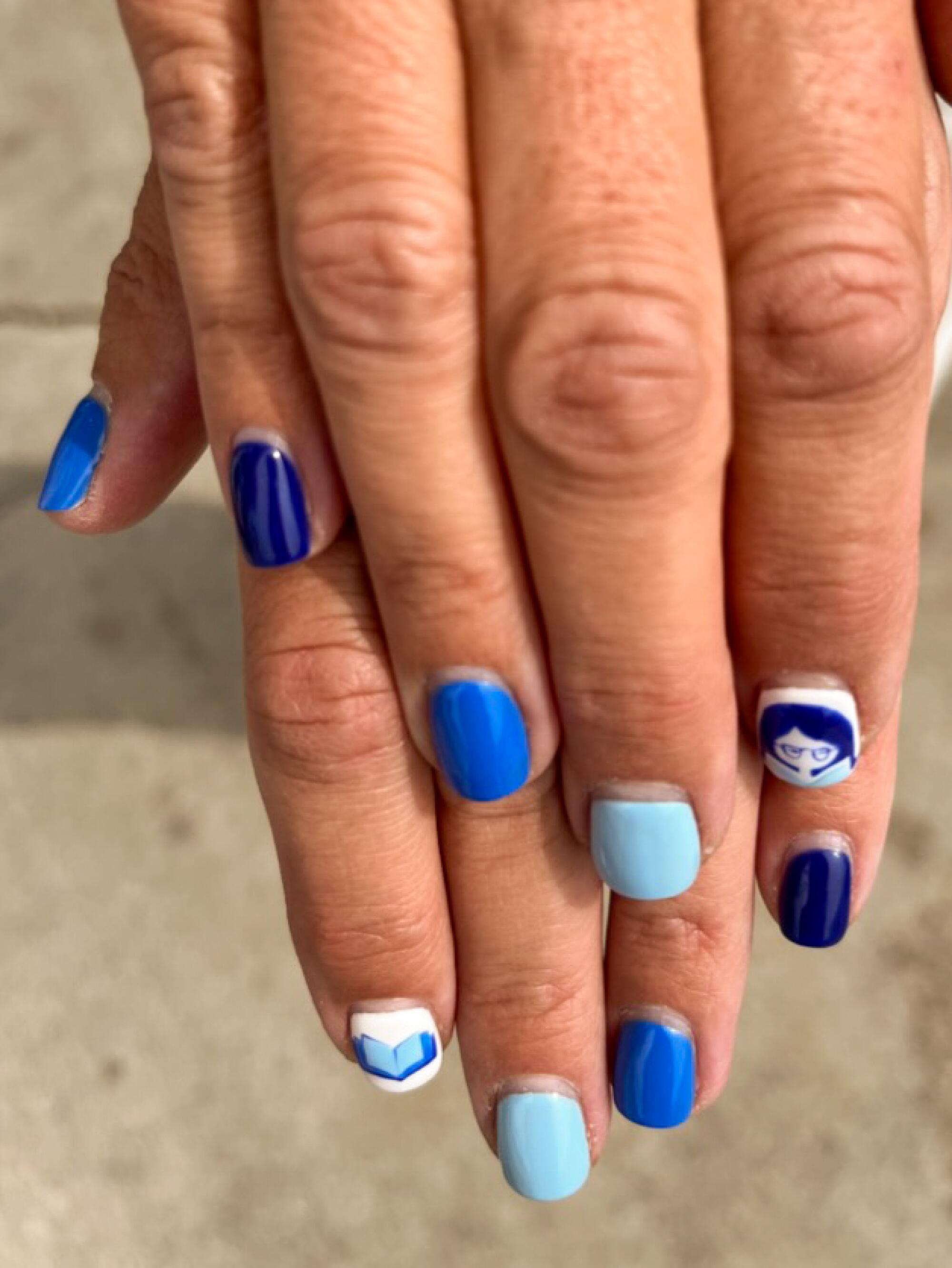 A guest's nails painted with Zibby Owens' podcast logo.