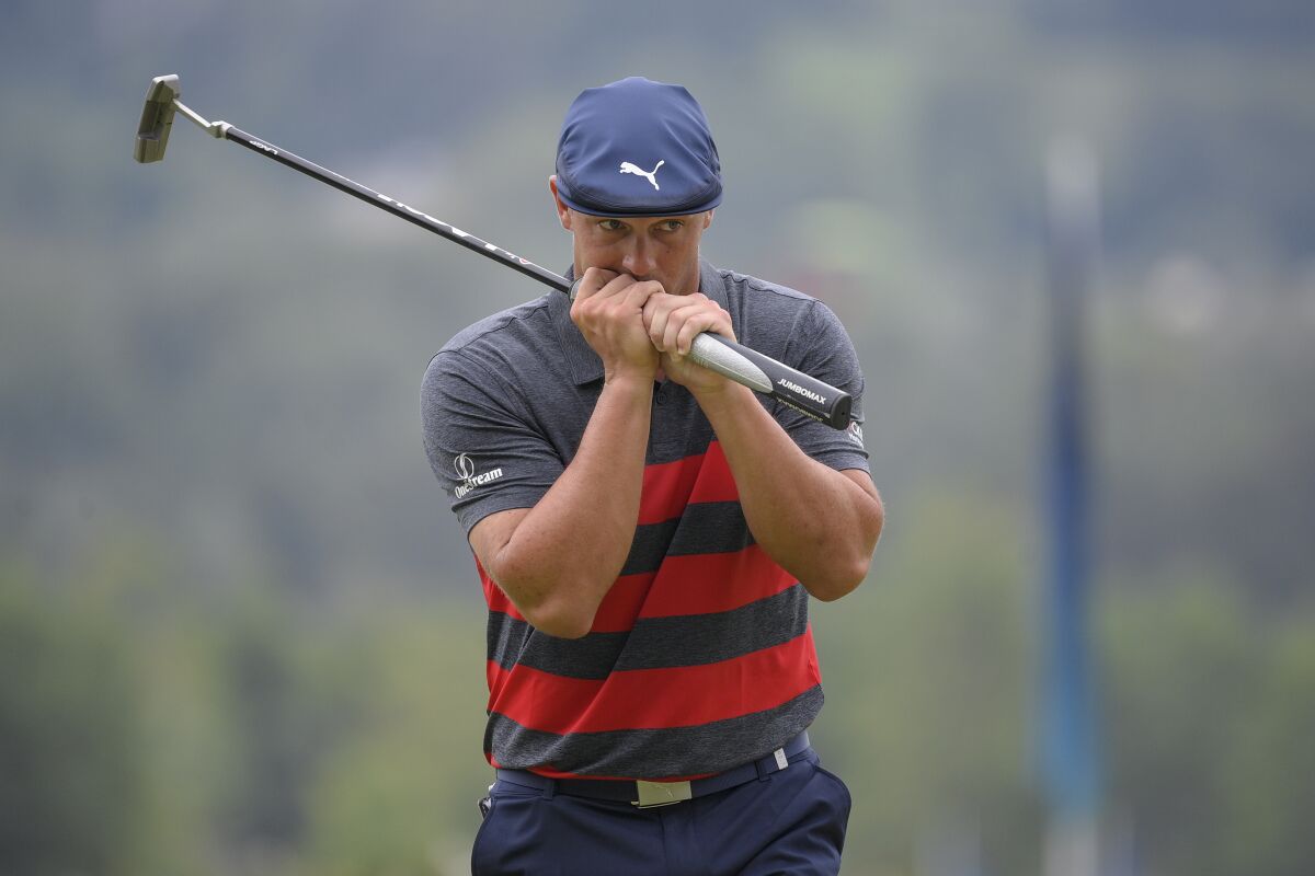 Bryson DeChambeau reacts after missing his putt on the ninth green during the final round.
