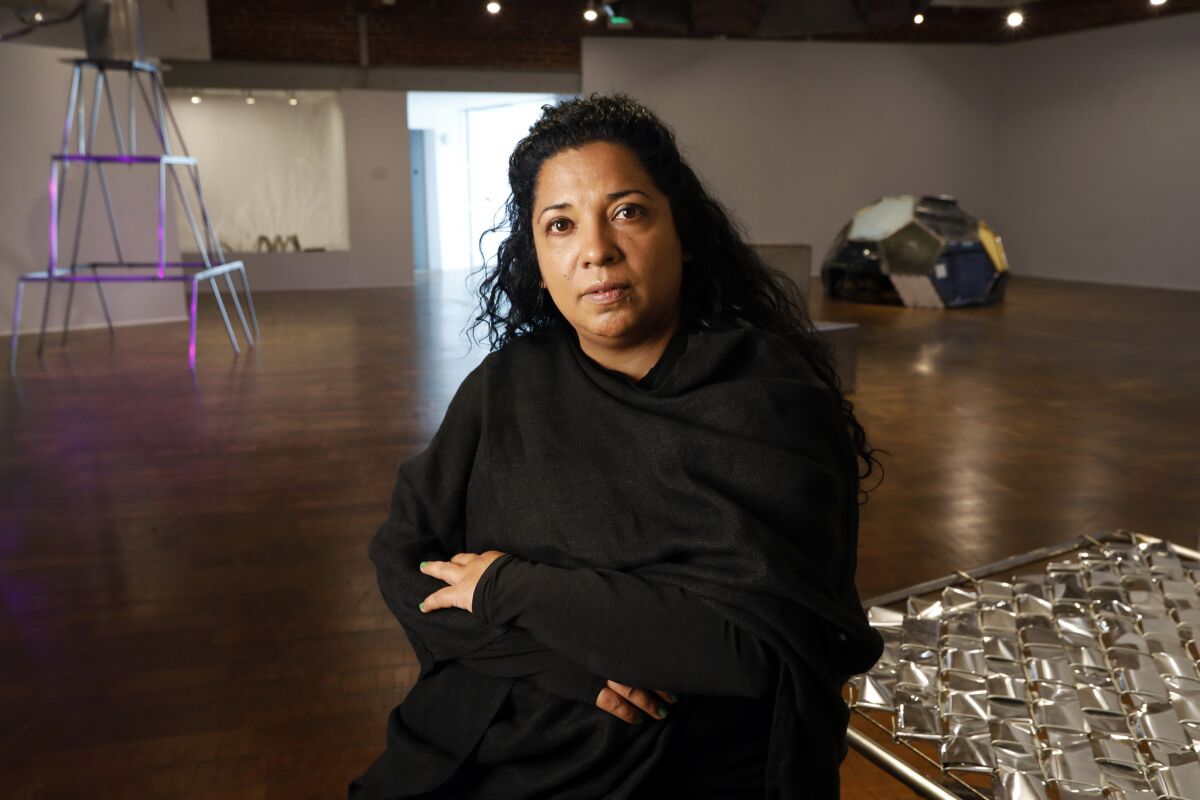 Beatriz Cortez, the artist behind the Craft Contemporary exhibit "Trinidad / Joy Station," featuring structures that imagine a space station informed by Mayan collective living practices.